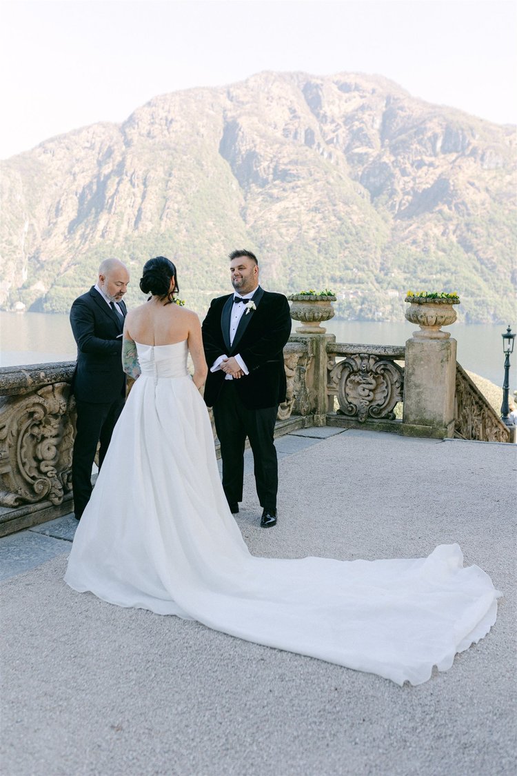 A symbolic ceremony at the balustrade of the loggia, above the lake