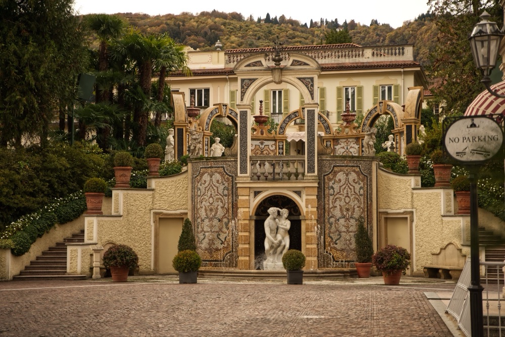 The Ninfeo dei Continenti fountain with statues and mosaic arches in the park of the Grand Hotel des Iles Borromées, Stresa, Lake Maggiore