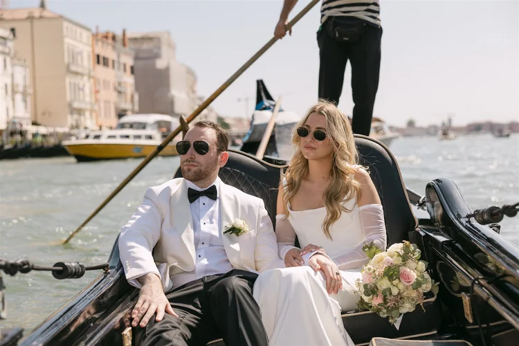 A couple on a gondola on the Grand Canal