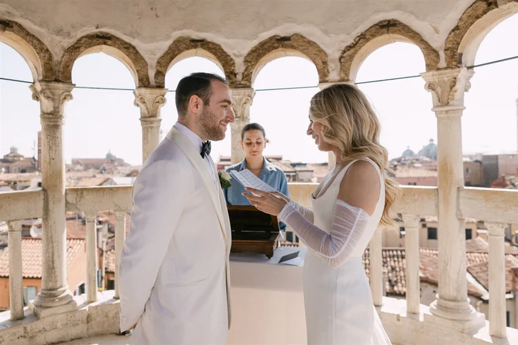 A symbolic ceremony at the top of the Scala Contarini del Bovolo