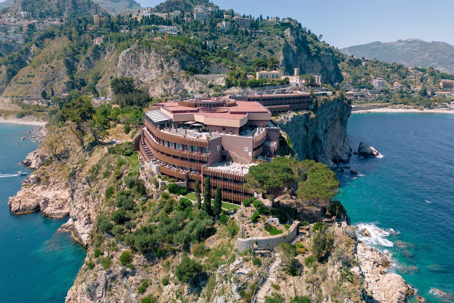 UNA Hotels Capotaormina on the cliffs of Capo Taormina, from above