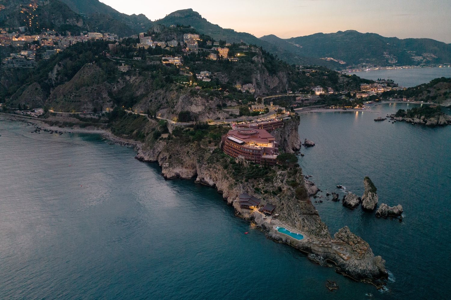 Capo Taormina at dusk from above