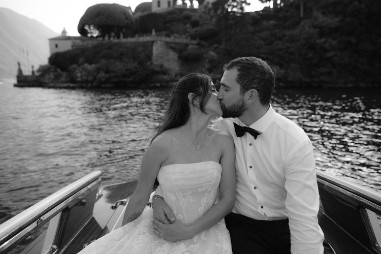 A kiss on the boat at dusk