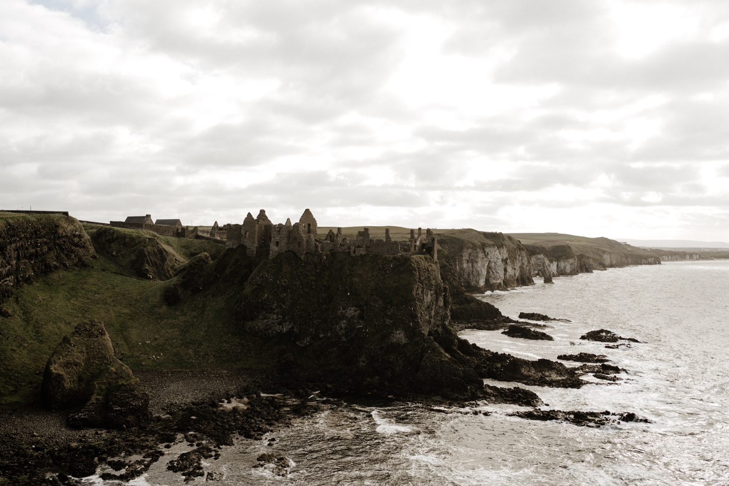 Dunluce Castle and the cliffs of the north coast of Northern Ireland, seen from the headland