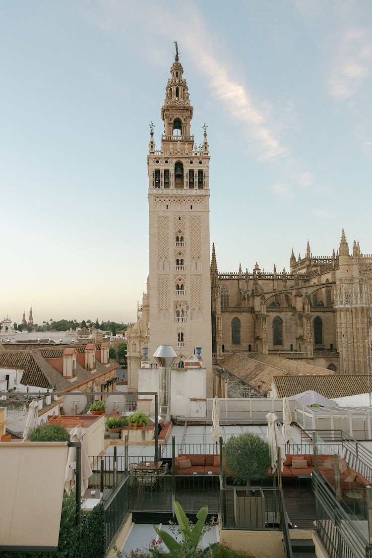 View of the Giralda tower and Seville Cathedral from the terrace of EME Catedral Mercer