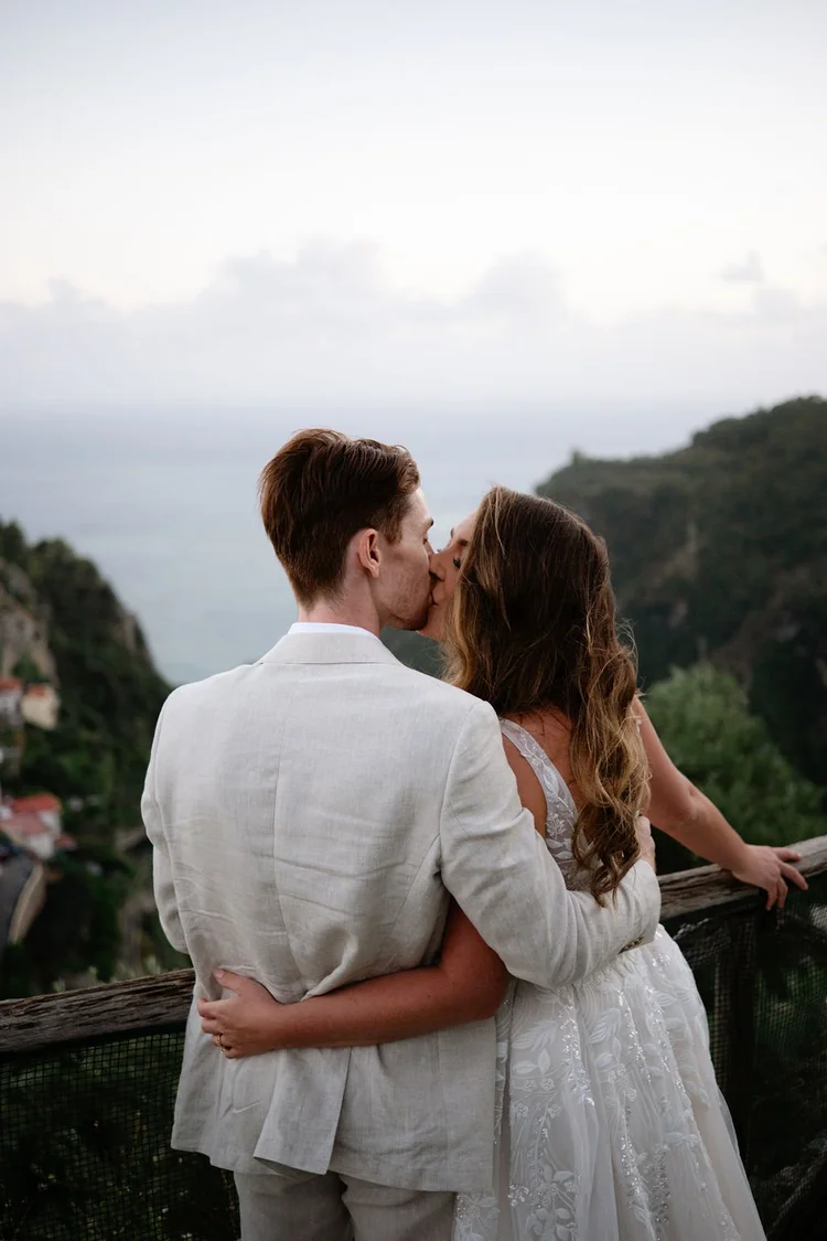 A couple at golden hour, above the valley