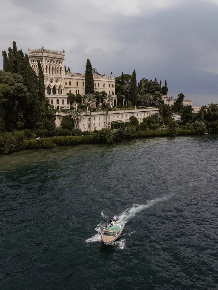 A private boat crossing Lake Garda towards Isola del Garda
