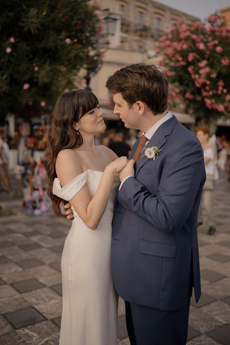 A couple sharing a quiet moment during their elopement in Sicily