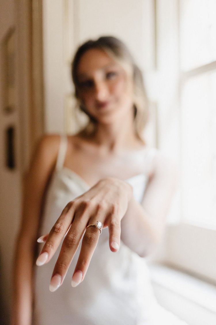 A bride showing her wedding ring during an elopement in Sicily
