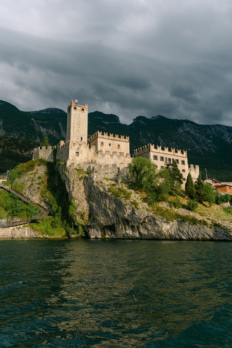 The Scaliger Castle of Malcesine on a rocky cliff above Lake Garda, Italy