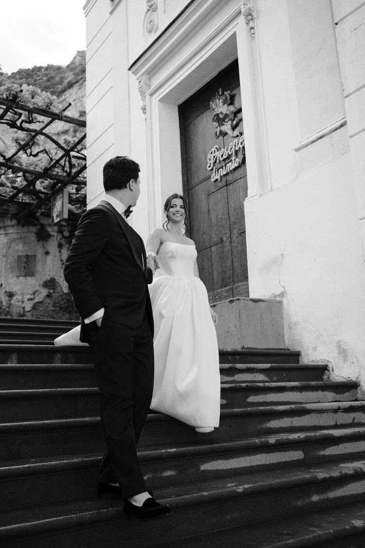 A couple on church steps in Positano