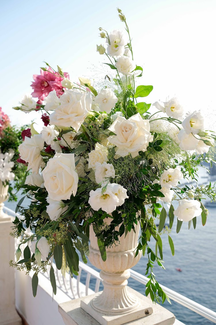 Flowers on the terrace, with the sea behind