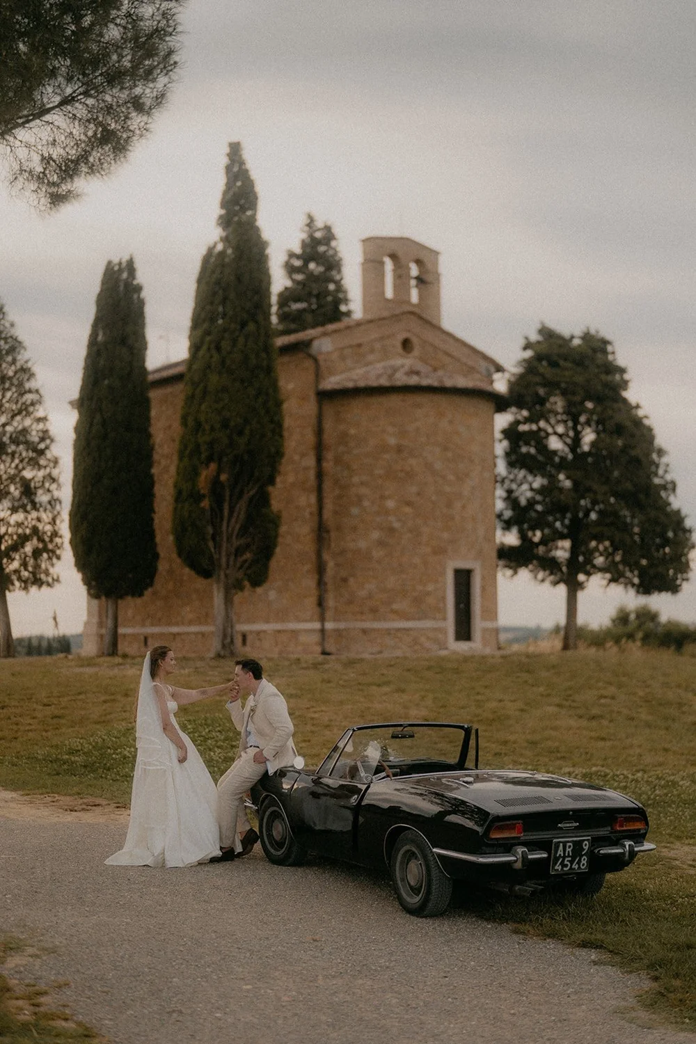 A countryside chapel in a UNESCO landscape — already designed elopement in Italy