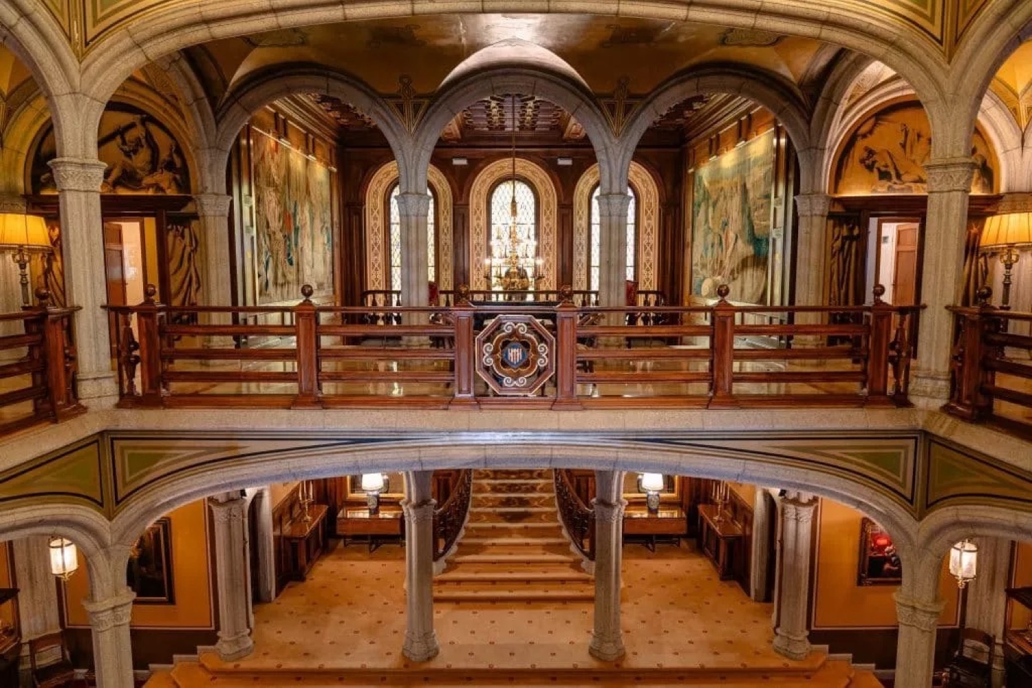 The wooden galleries and arches of the hall at Bell Reco on the Costa Brava