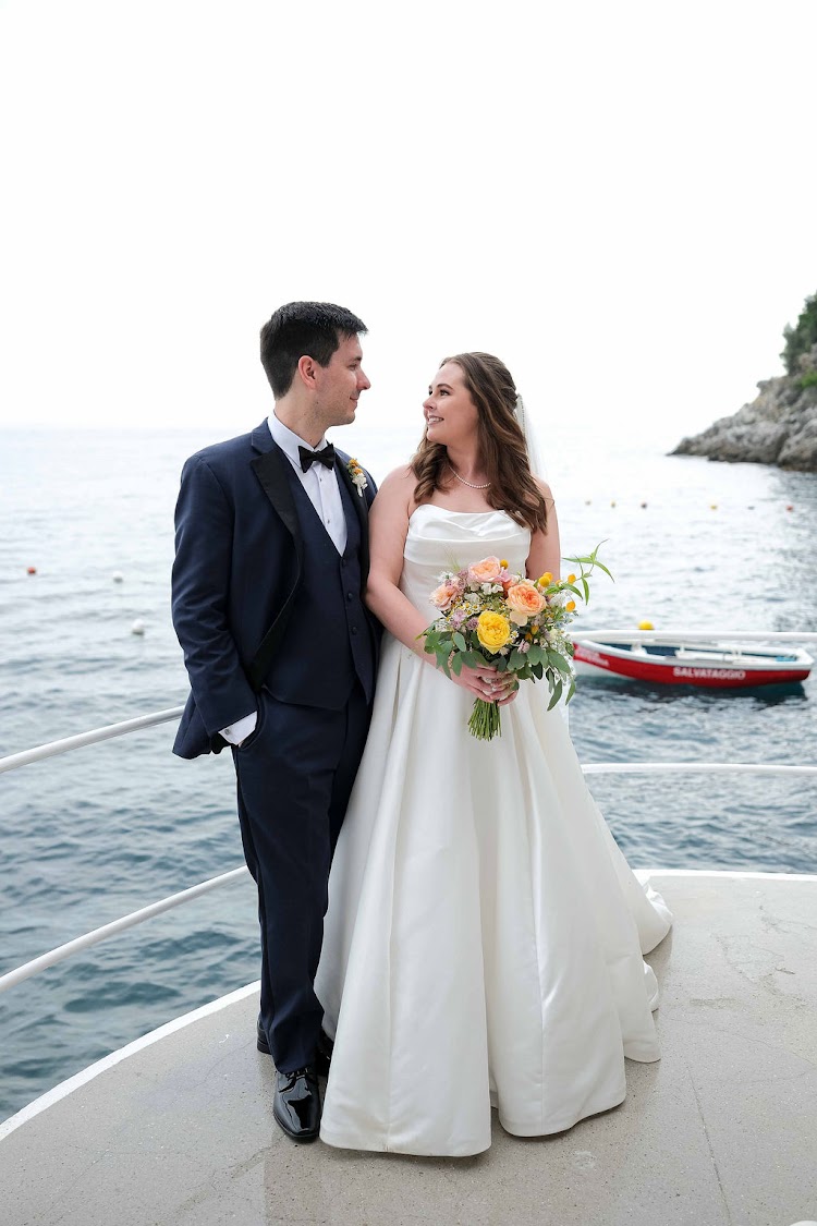 Couple on a sea terrace at Hotel Santa Caterina overlooking the Amalfi Coast