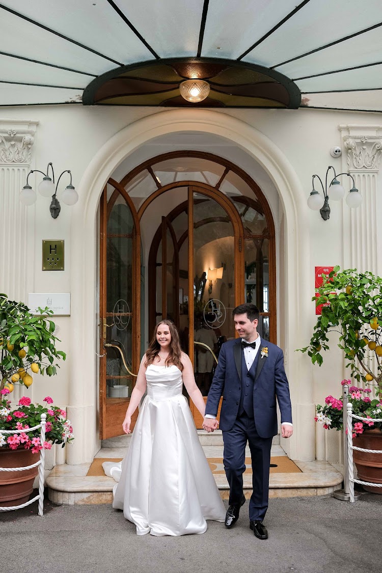Couple walking out of the entrance of Hotel Santa Caterina on the Amalfi Coast