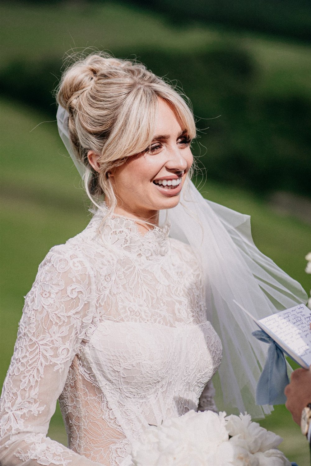 A bride smiling during the ceremony