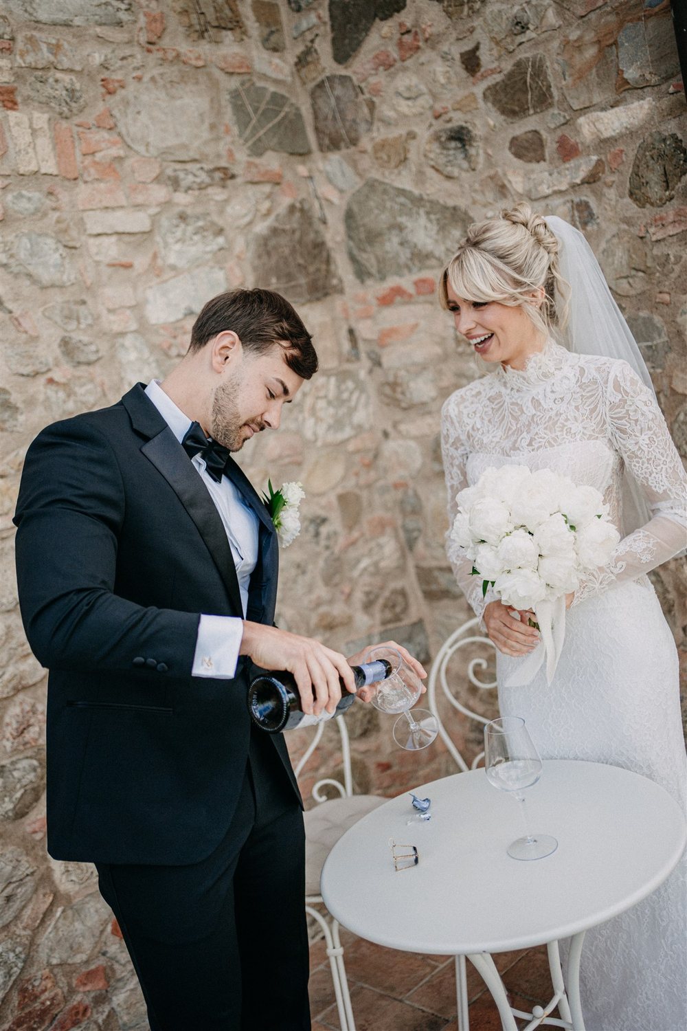 Pouring a glass after the ceremony