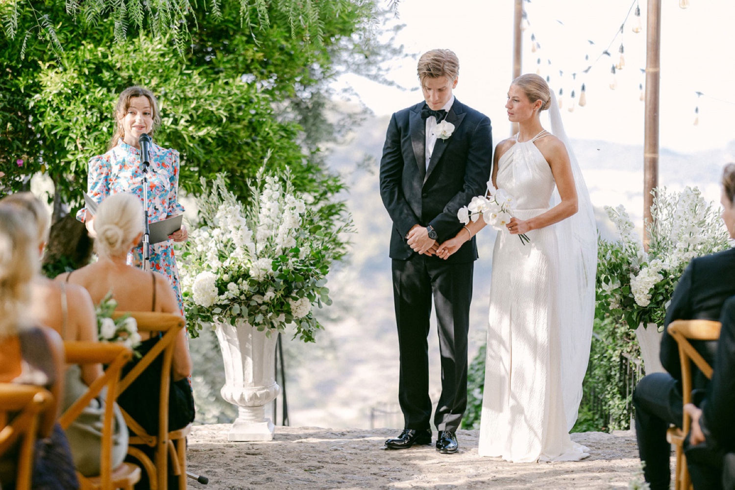 A groom and bride standing together at their ceremony in the gardens of Ca’s Xorc in Mallorca