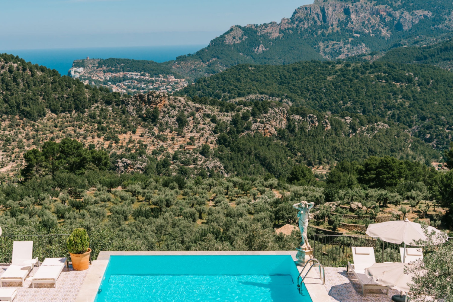 The mountains and the coast of Mallorca seen from the pool terrace at Ca’s Xorc